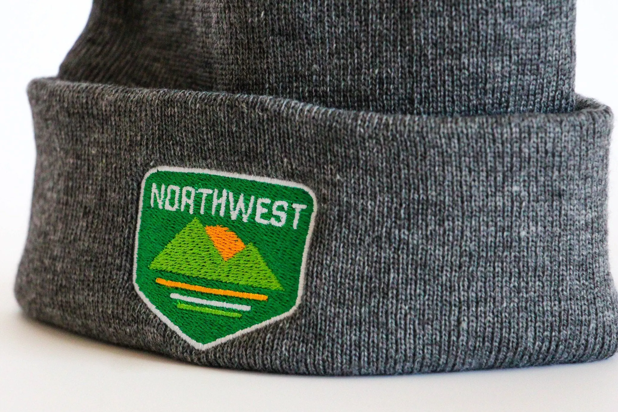 Northwest Pom Pom Knit Beanie